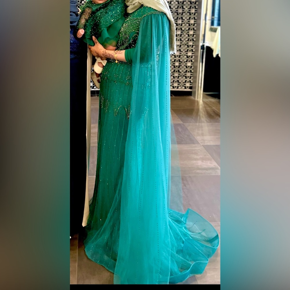 Size 8 emerald green gown with cape sleeves